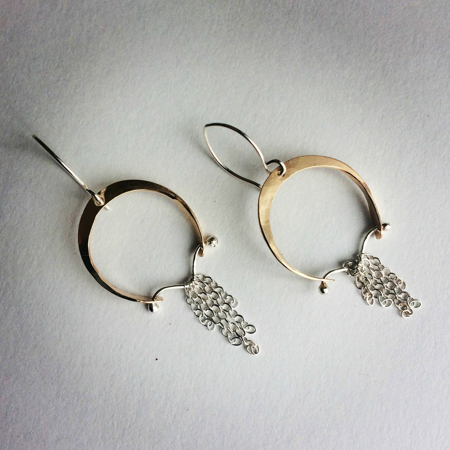 Artemis' Bow hoop earrings by Ann Madland